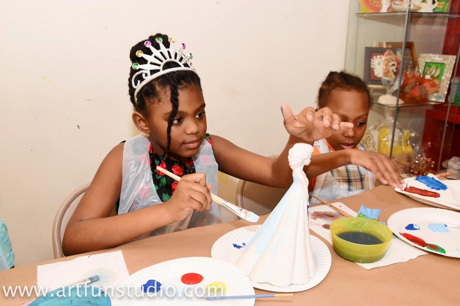 Ceramic painting is an option during birthday party event