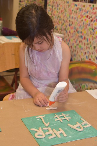 Girl creates present for dad