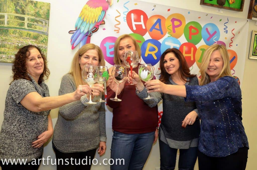 bachelorette party celebration with wine glass painting