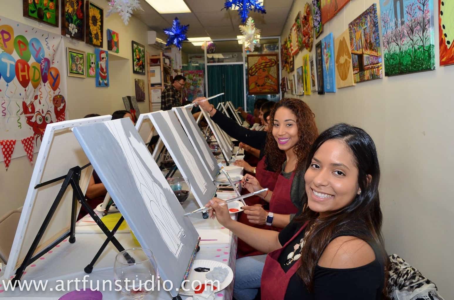Ladies enjoy creating artwork in Art fun Studio, Brooklyn