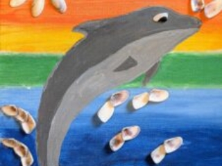 mixed media project with jumping dolphin