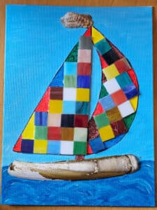 a sailboat with mosaic
