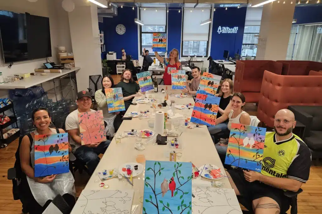 Employee enjoy their paintings Group picture