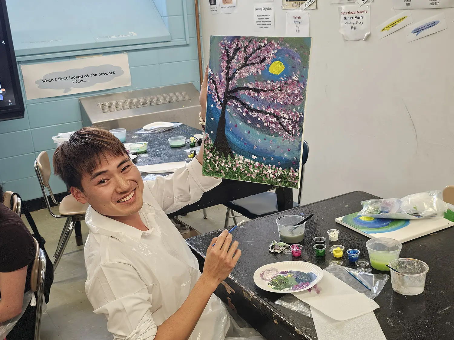 Happy teacher during the art workshop